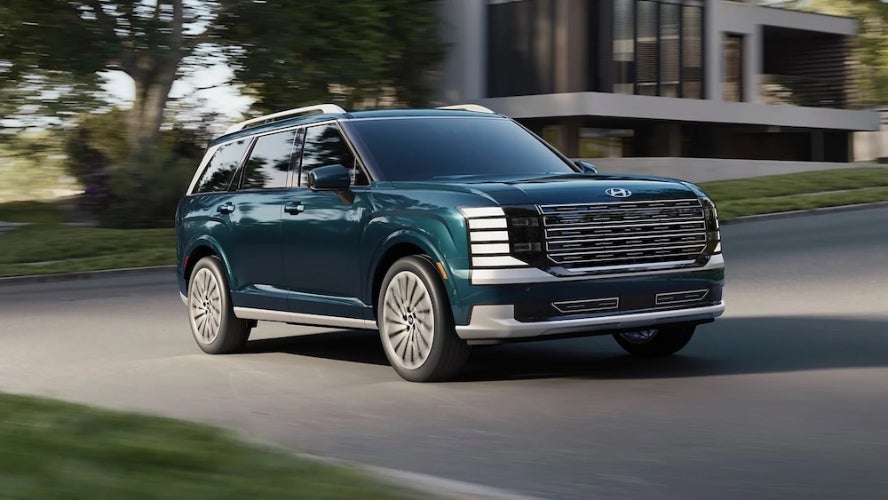 A dark green 2026 Hyundai Palisade SUV 